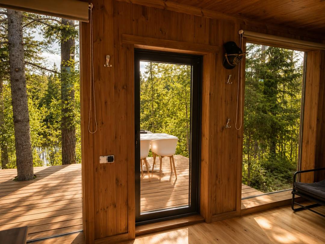 Hunter's Cabin — black forest cabin with panoramic glazing — 3